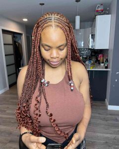 Middle Part Ginger Cornrows With Curled Ends