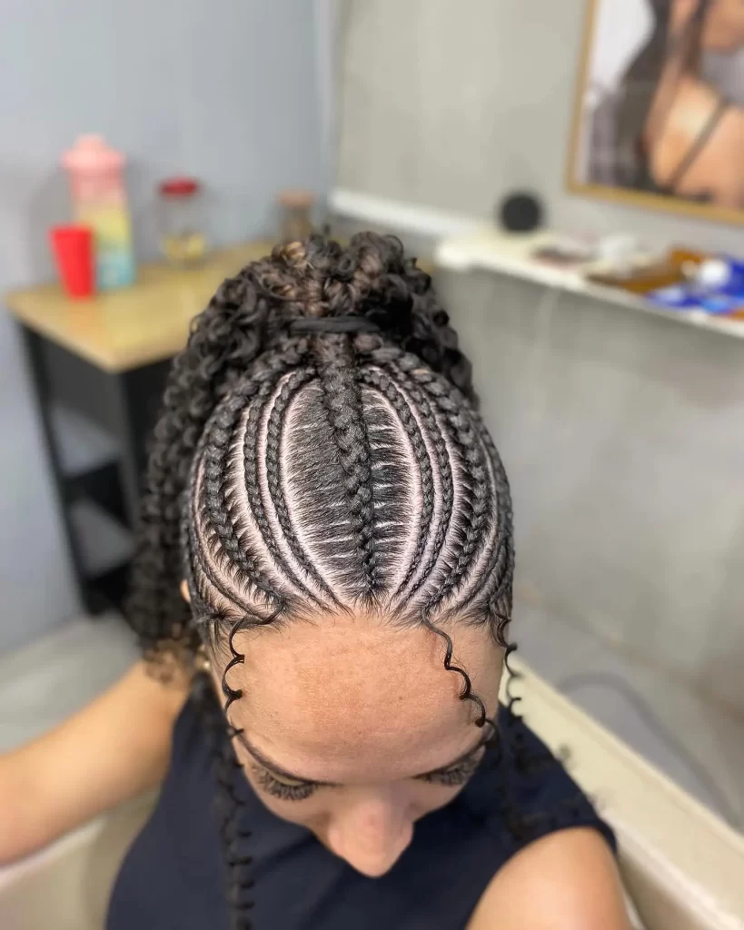 Sleek Cornrow Ponytail with Curly Extensions